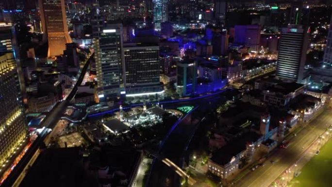 夜间照明吉隆坡城著名的宫殿滨江湾交通街道高空俯视图4k马来西亚