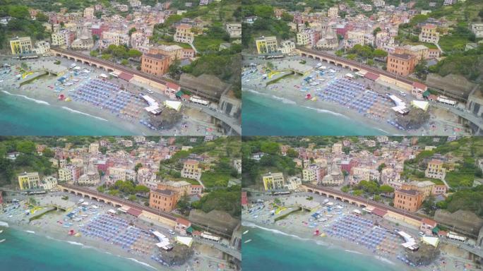 意大利拉斯佩齐亚五渔村之一蒙特罗索阿尔马雷村的全景。在半岛上飞行，俯瞰海岸、海洋、海滩和船只。4 k