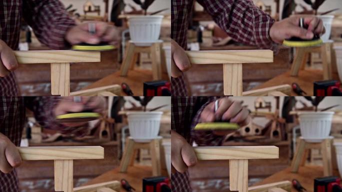 男人在家的日常生活方式。木工和DIY复古木制花盆架，用于花园装饰。木匠和工匠车间。