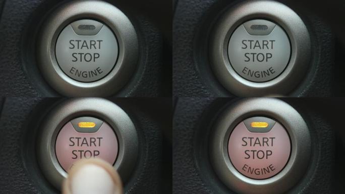 汽车中手指按下启动发动机按钮的特写