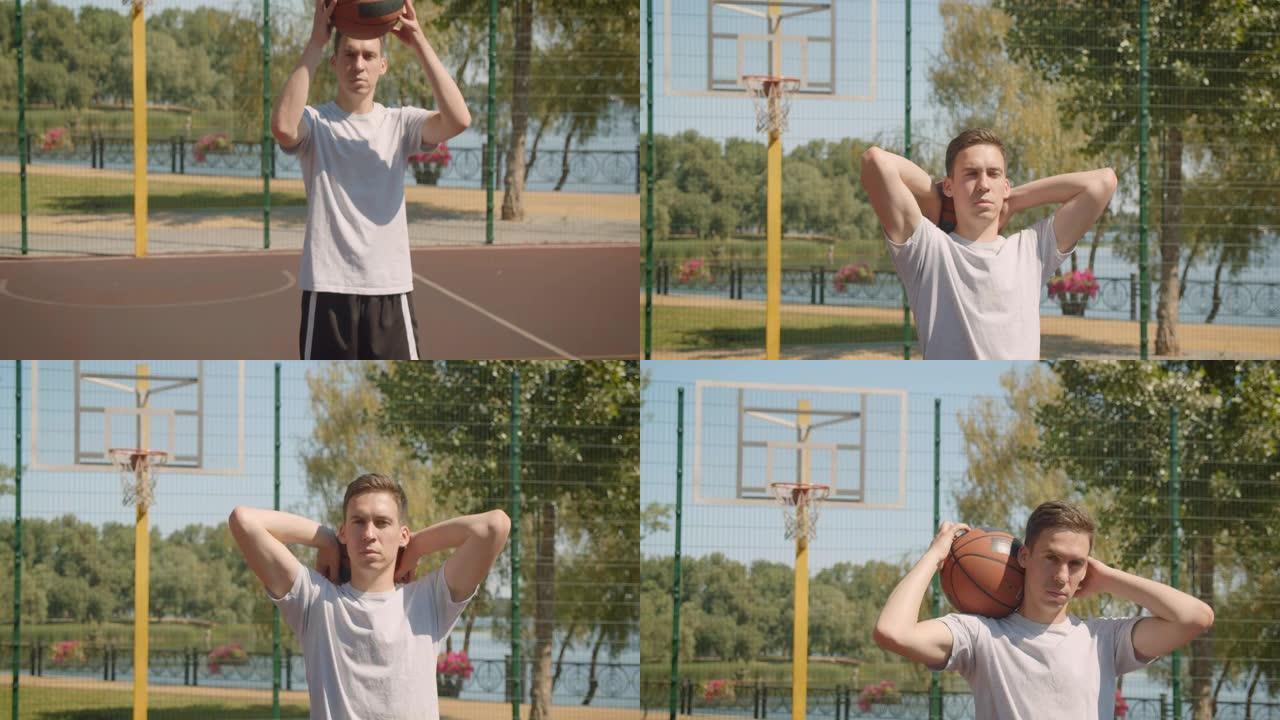 年轻英俊的白人男子篮球运动员的特写肖像背后拿着球看着户外球场上的相机，背景是布里奇