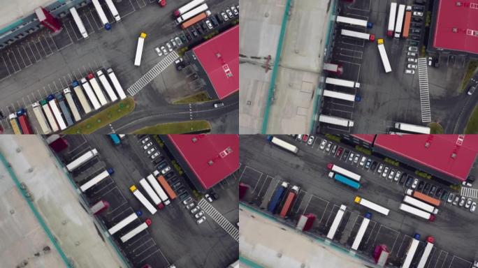 工业仓库装卸码头的航拍，许多带有半挂车的卡车装载商品。