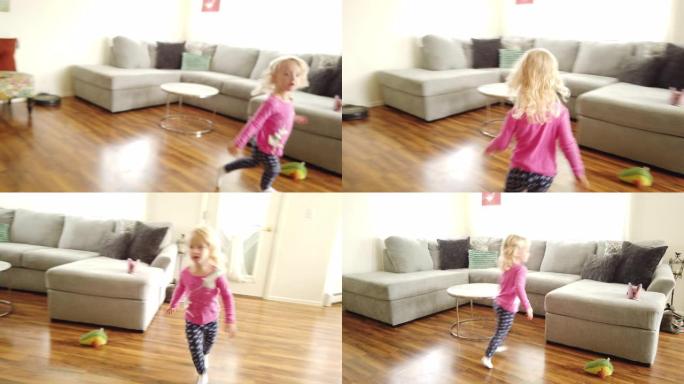 年轻的蹒跚学步的女孩在现代住宅视频系列中嬉戏和跑来跑去