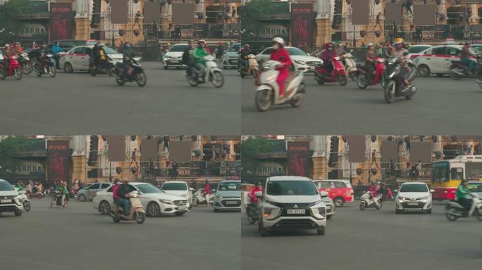 越南河内市一条挤满汽车和摩托车的繁忙拥挤的街道