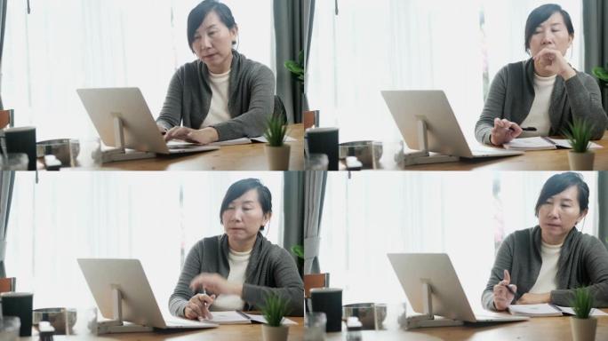 亚洲女性使用笔记本电脑在家工作，生活方式观念和新的正常观念。