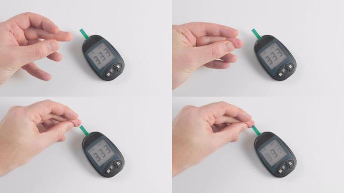 一个无法识别的人测量血糖葡萄糖。用笔刺穿手指的皮肤，并在放置的测试条上滴一滴血。糖尿病的概念预防