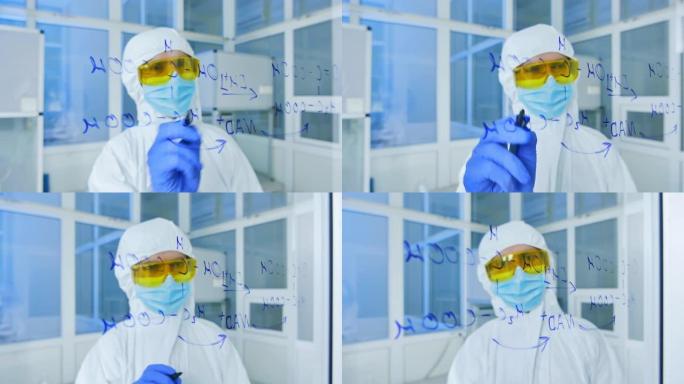 穿着防护服的科学家在玻璃上绘制化学式。