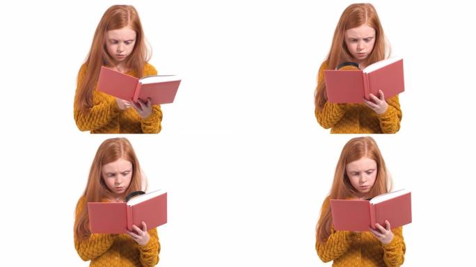儿童好奇心和教育的概念。一个留着长发的小女孩通过放大镜看书的特写镜头。孤立，在白色背景上