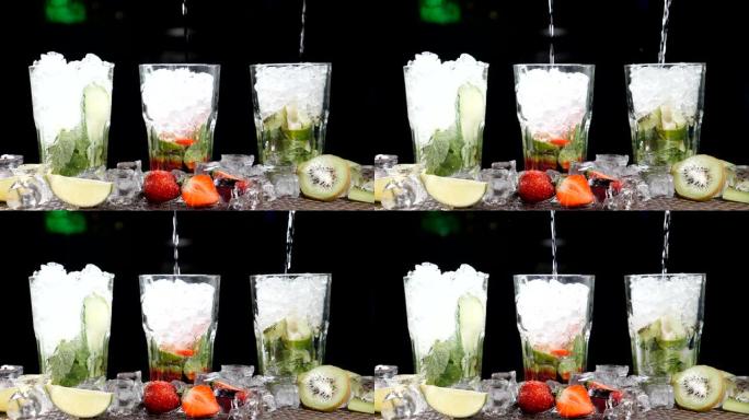 酒吧和鸡尾酒概念。酒保准备不同的莫吉托鸡尾酒。特写。飞溅。慢动作。