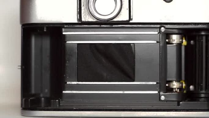 旧胶卷相机的快门坏了，慢动作。