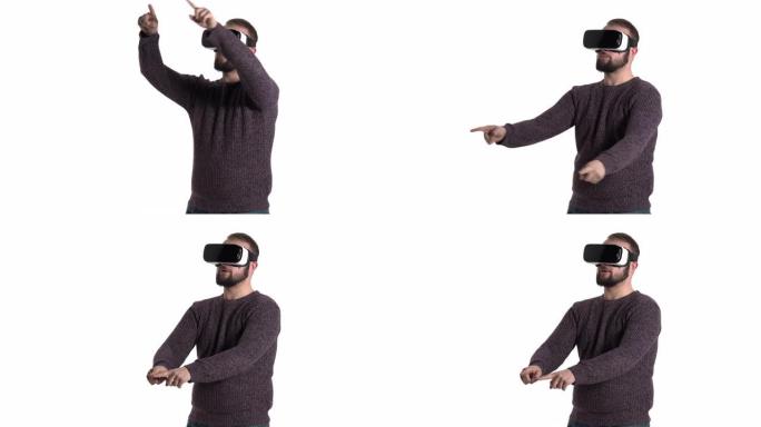 大胡子男人正在玩虚拟现实眼镜。人在空中画假想的圆圈，享受新的体验。酷高科技设备使用概念。
