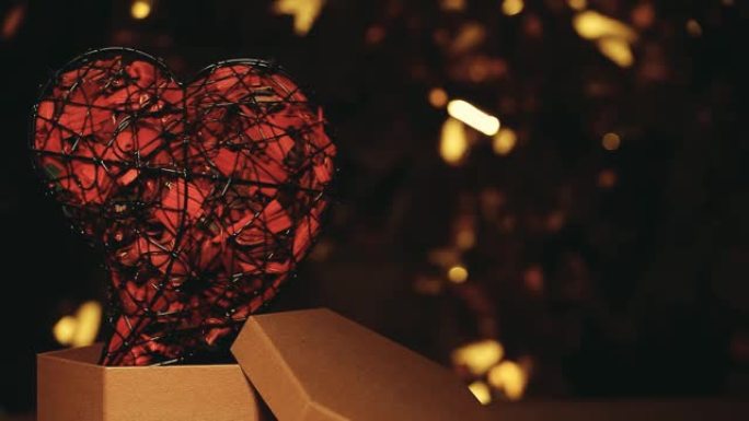 心形纸盒深色背景金色bokeh高清素材