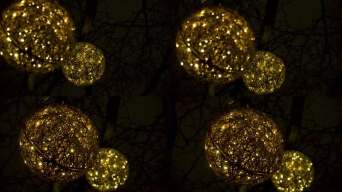 树上挂着两个黄色的灯球