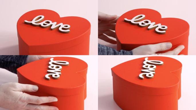 心形糖饼干在礼品盒中装饰有皇家糖衣。