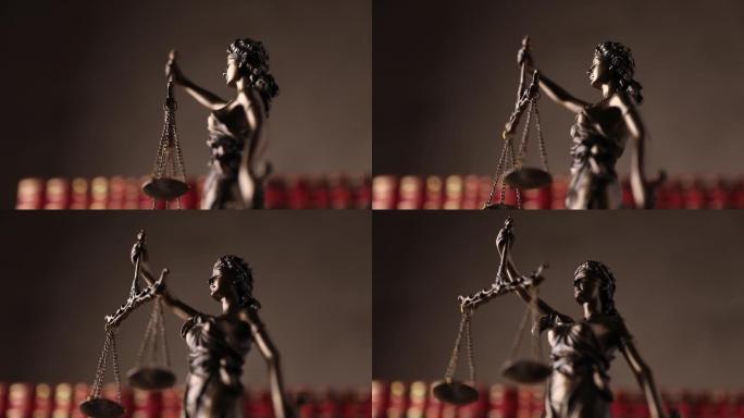 被蒙住眼睛的女士举着象征权力和公正的剑，在棕色背景的红书前旋转的正义雕像