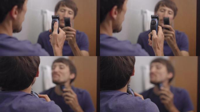 一个年轻人用胡须修剪器剃掉胡须的特写镜头
