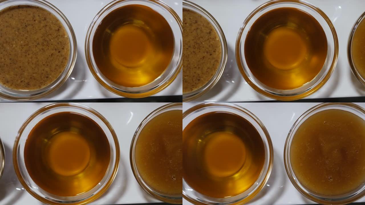 玻璃碗上纯正宗的摩洛哥坚果油，摩洛哥坚果蜜和由摩洛哥坚果油制成的传统Amlou。