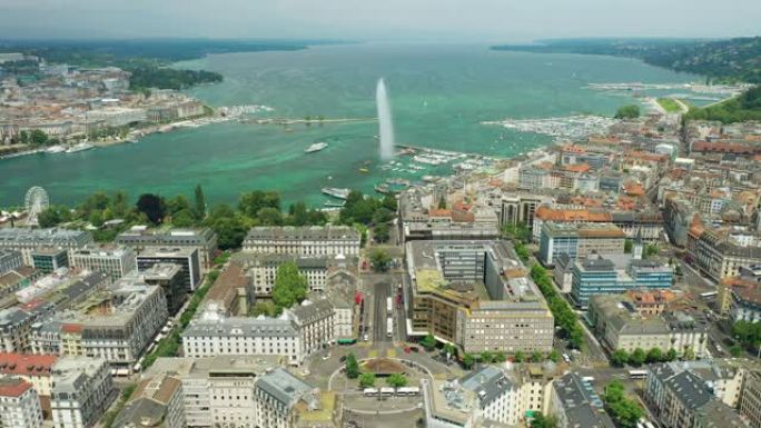 飞行在阳光明媚的日子日内瓦城市湖边喷泉交通街圈空中全景4k瑞士