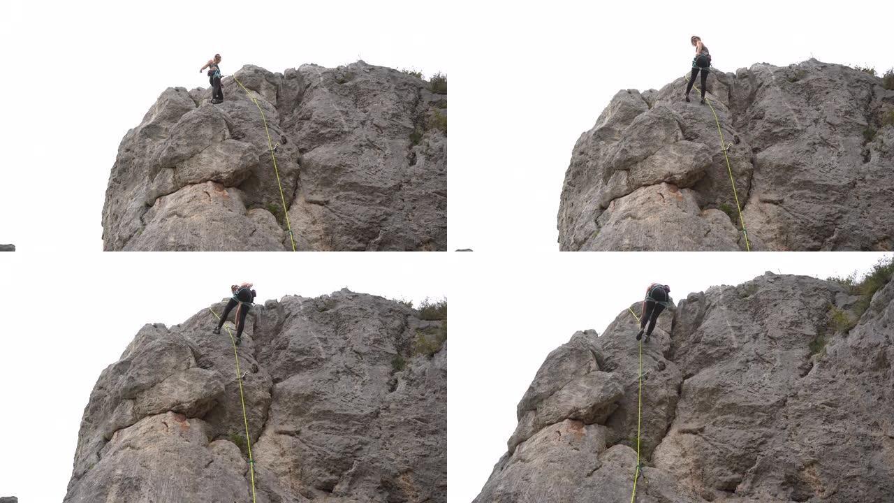 自由登山者沿着岩层移动