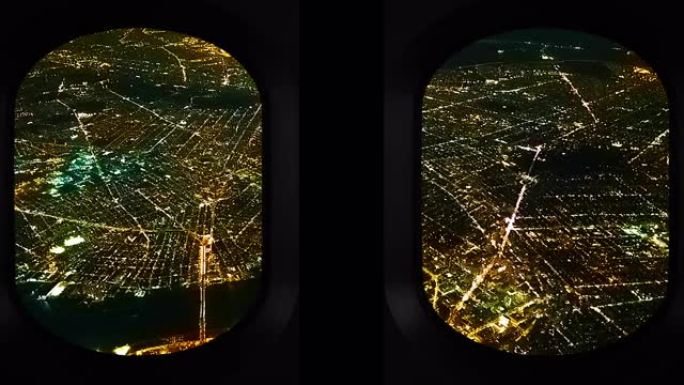 一架私人飞机在夜间接近纽约市降落时从窗户上看到的景色