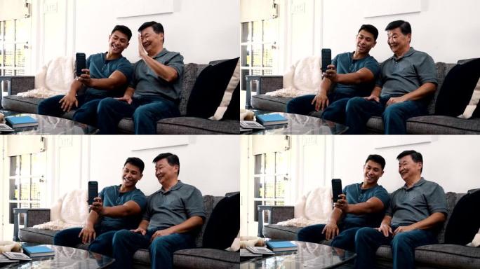 成年男子和他的高级父亲与家人视频聊天