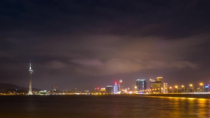 夜间照明日落天空澳门城市景观湾全景4k延时中国