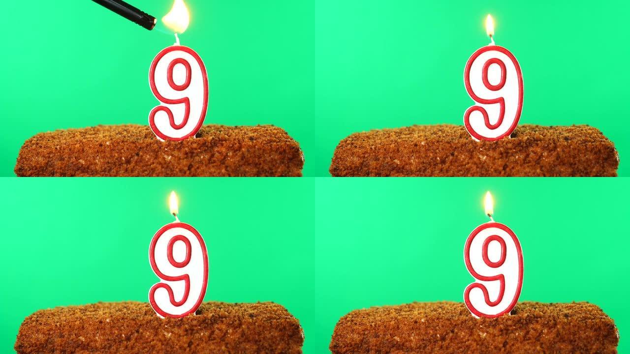9号点燃蜡烛的蛋糕。色度键。绿屏。隔离