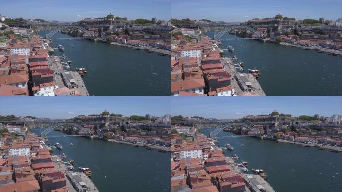 阳光明媚的日子波尔图市著名的dom luis douro河大桥空中全景4k葡萄牙