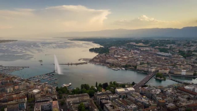 阳光明媚的日落日内瓦湖湾著名喷泉城市景观空中全景4k时间流逝瑞士