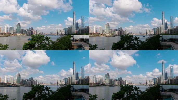 延时4k镜头美丽的上海浦东陆家嘴城市景观白云蓝天背景，货船在黄浦江上航行，b滚动拍摄。