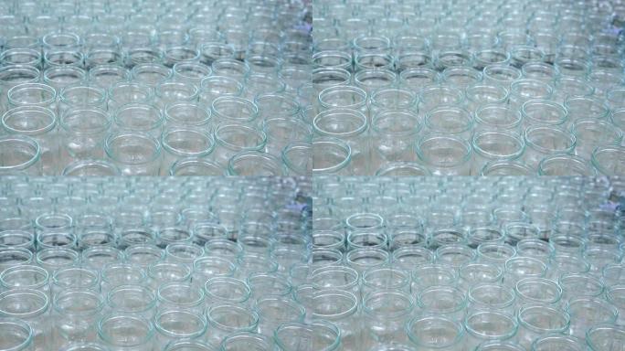 装瓶厂，工厂生产线上或商店出售的透明空玻璃瓶
