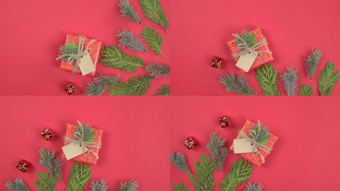 圣诞背景360度旋转。冷杉树枝和礼品盒在红色背景上旋转。