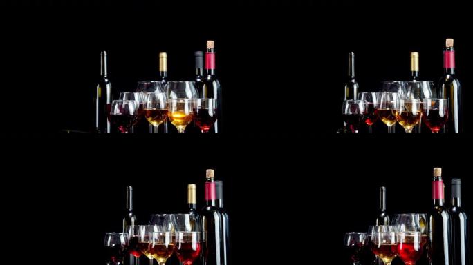 玻璃杯中的不同葡萄酒会缓慢旋转。