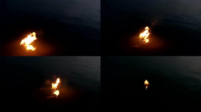 一艘纸船漂浮在河上，半夜燃烧。纸折纸。