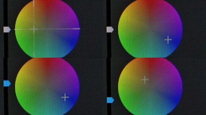 显示器屏幕上的颜色校正圆轮关闭。像素放大了计算机图形监视器上的红色，蓝色和绿色发光晶体和图案