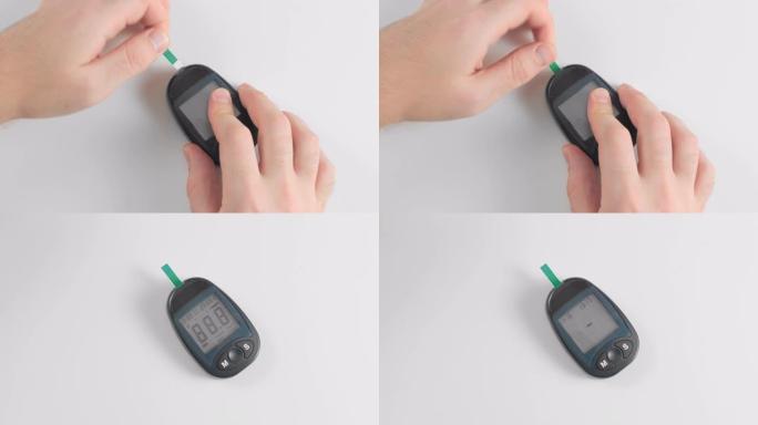 无法识别的人准备一台血糖仪来测量血糖，糖水平，以进行测量。将单个试纸测试充电到测量装置中。糖尿病的概