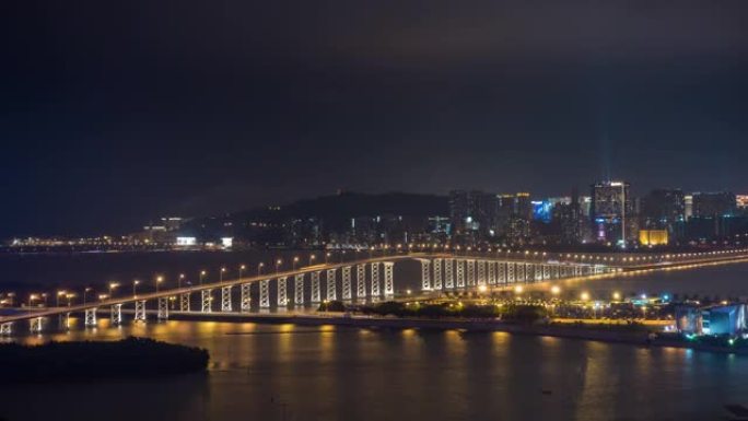 夜间照明澳门城市景观交通桥屋顶全景4k延时中国