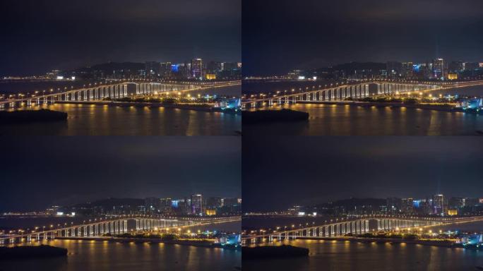 夜间照明澳门城市景观交通桥屋顶全景4k延时中国