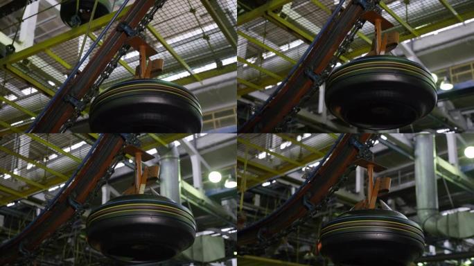 空气输送机将轮胎转移到工作车间的特写镜头中