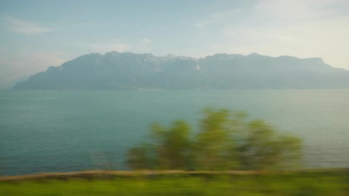 阳光明媚的一天，沃维市火车公路旅行日内瓦湖边的波夫全景4k瑞士