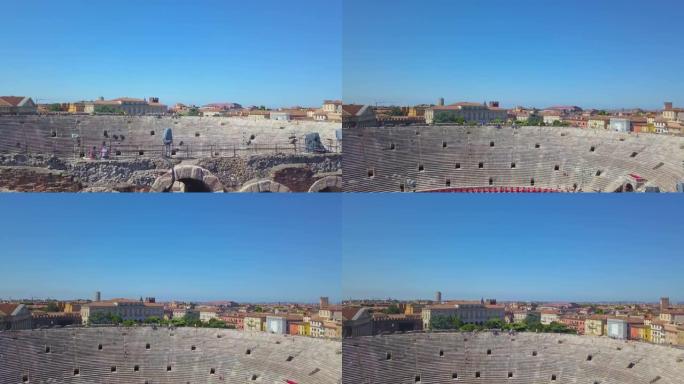 意大利维罗纳竞技场的鸟瞰图。视频是由一架从墙后升起的无人机制成的。竞技场和城市的景色打开。