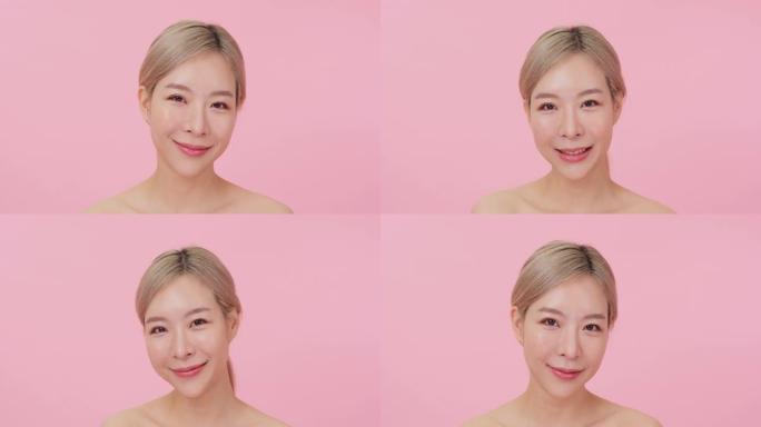 美丽的韩国女人的肖像带着迷人的微笑看着镜头。