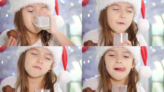 剪短的4k视频，小女孩戴着圣诞老人的帽子喝牛奶，在家吃美味的饼干。