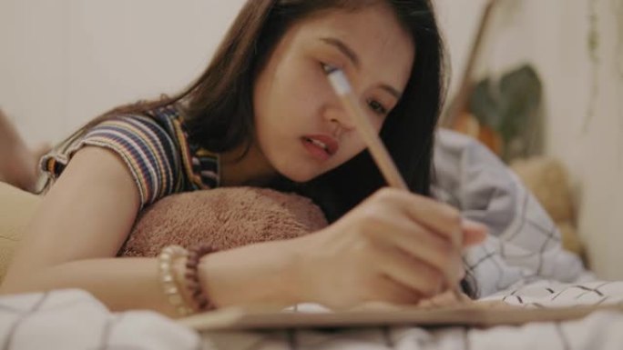 泰国女孩正在勾勒创意-股票视频