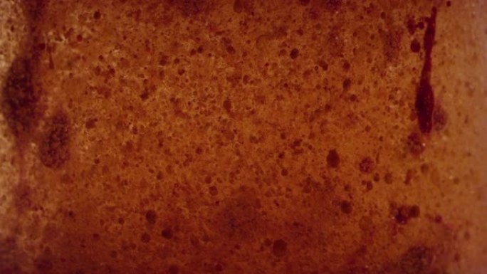 宏观橙红色液体行星表面抽象纹理背景