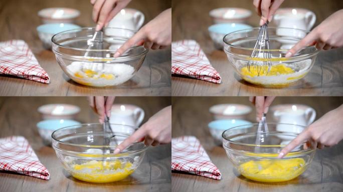 在玻璃碗里搅拌鸡蛋和糖。