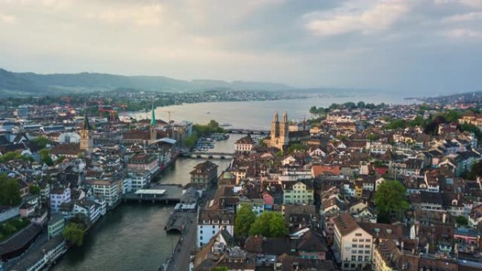 瑞士夏季日落天空苏黎世城市景观湖边空中全景4k延时