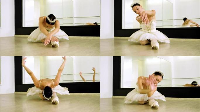 芭蕾舞演员的舞蹈。女芭蕾舞演员在工作室穿着足尖鞋跳舞。4K