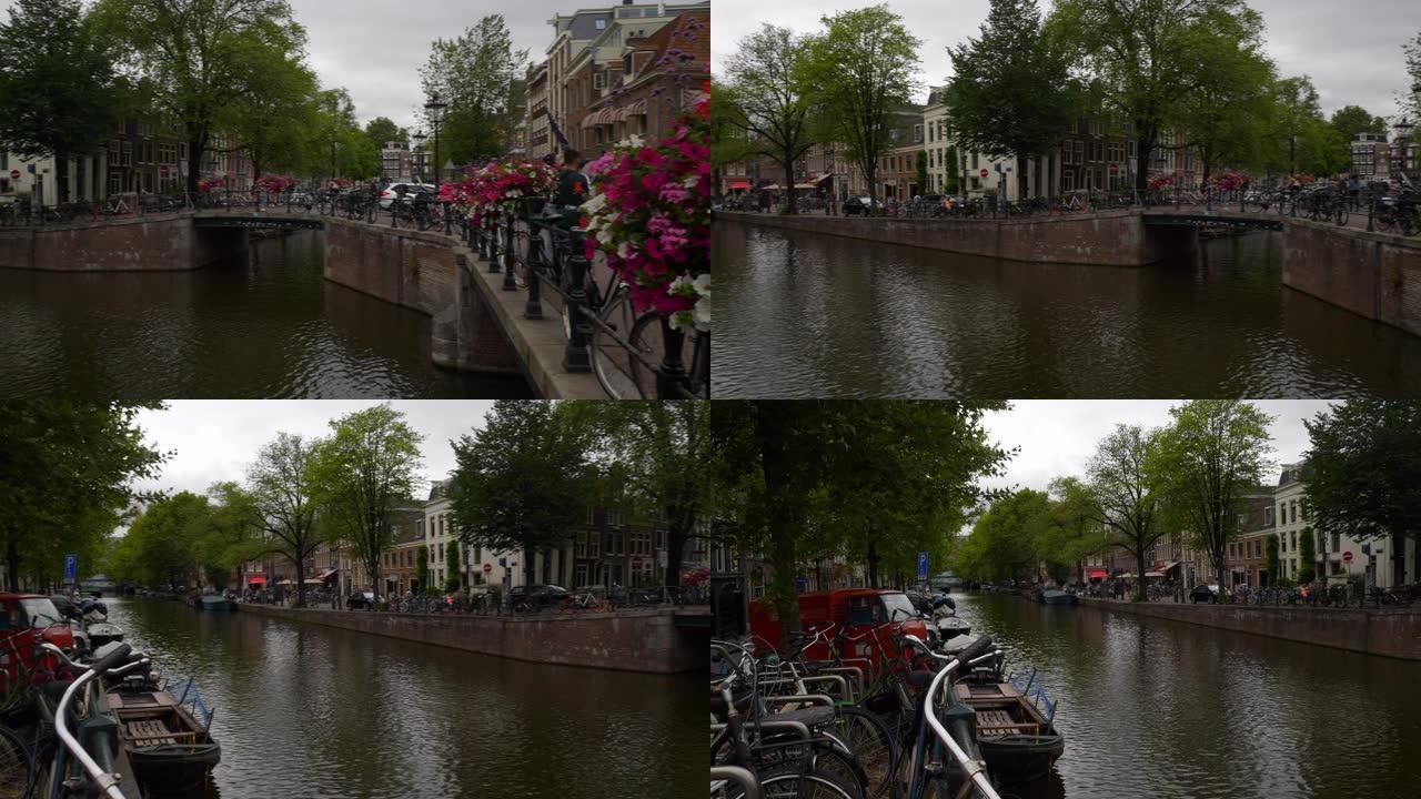 白天阿姆斯特丹城市交通街运河桥慢动作全景4k荷兰
