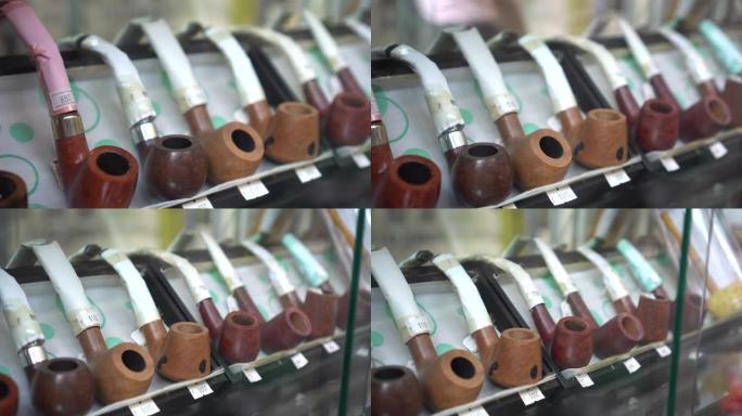 带价格标签的木制烟斗在商店出售给吸烟者的奢侈品礼物
